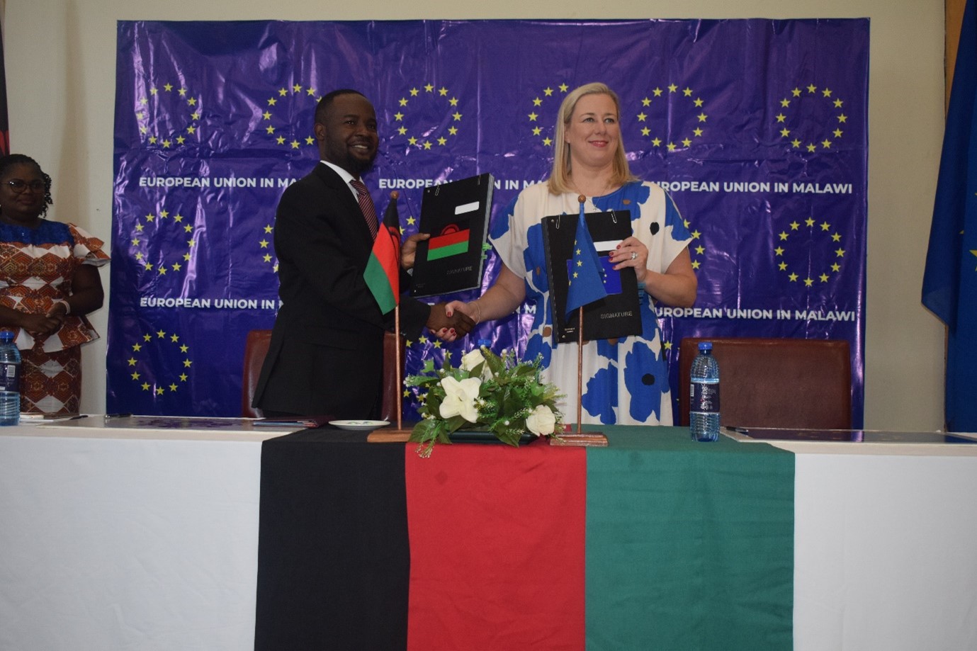The Minister of Finance and Economic Affairs, Hon. Sosten Gwengwe, MP and the EU Commissioner for International Partnerships, Jutta Urpilainen during signing ceremony of the NDICI 6-Financing Agreements on 28 October, 2022 at BICC in Lilongwe