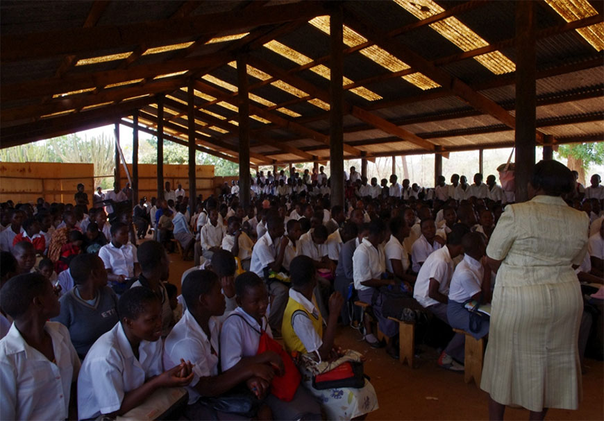 A pigsty which is used as a hall, and parts of it as classrooms A pigsty which is used as a hall, and parts of it as classrooms